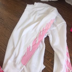 a white pink flame shirt